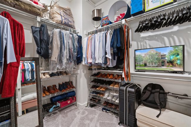 Walk in closet featuring carpet | Image 20