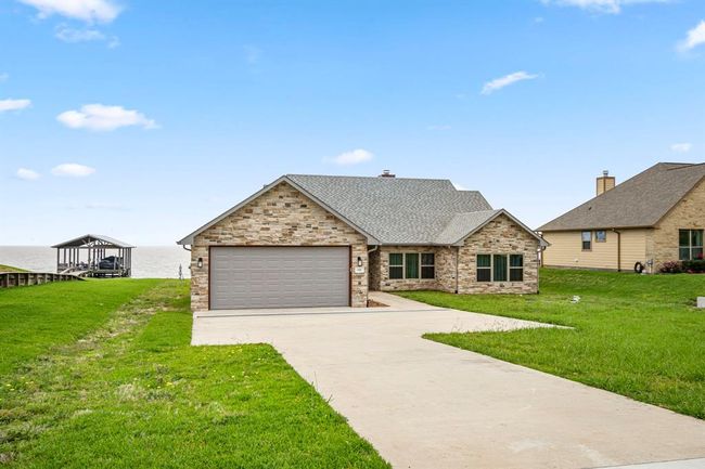 Waterfront views with instant Lake access makes this Home an absolute dream! | Image 2