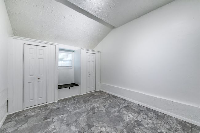 Bonus room featuring a textured ceiling and vaulted ceiling | Image 18