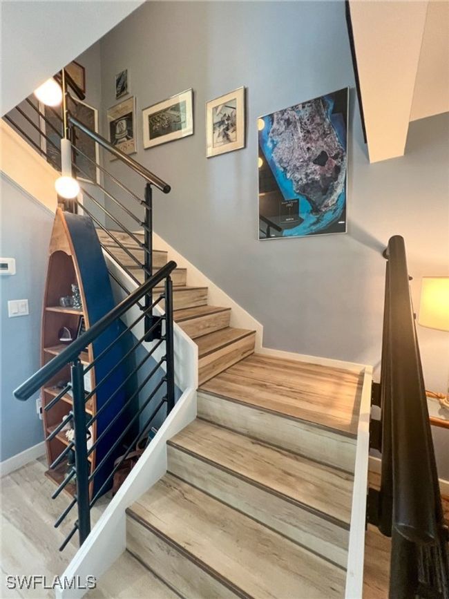 Staircase with wood-type flooring | Image 7