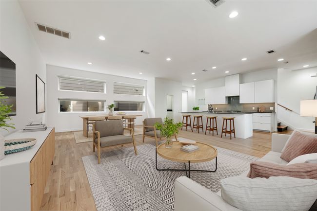 Living area with light wood-style flooring, recessed lighting, and baseboards | Image 6