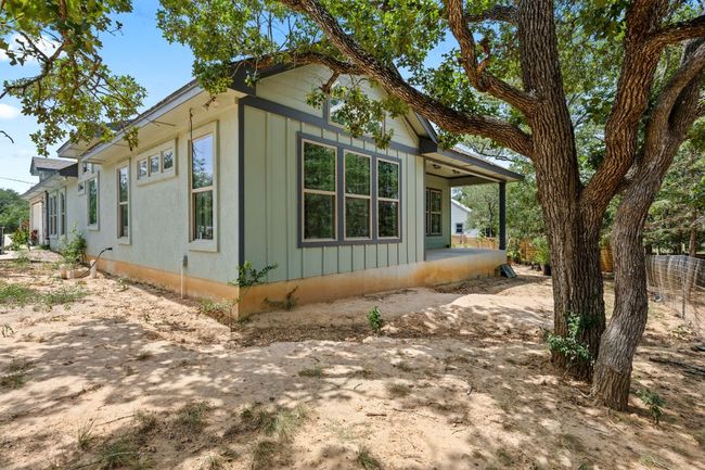 View of property exterior featuring covered porch | Image 26