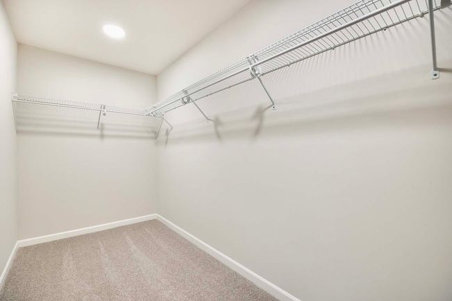 Large walk-in closet in primary bedroom. | Image 14