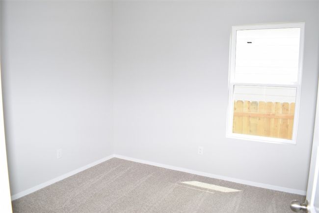 Empty room featuring carpet flooring and baseboards | Image 17
