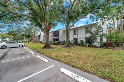 You have a designated parking spot directly in front of the walkway to your front door! | Image 3