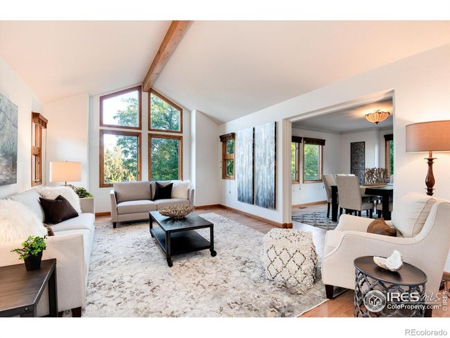 Lovely solid hardwood floors in ample sized living room | Image 6