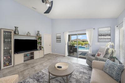 Living room pool and pond view | Image 2