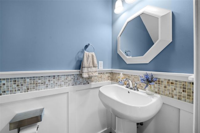 Bathroom with wainscoting and a sink | Image 13