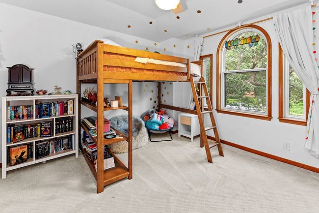 Bedroom with carpet and baseboards | Image 22