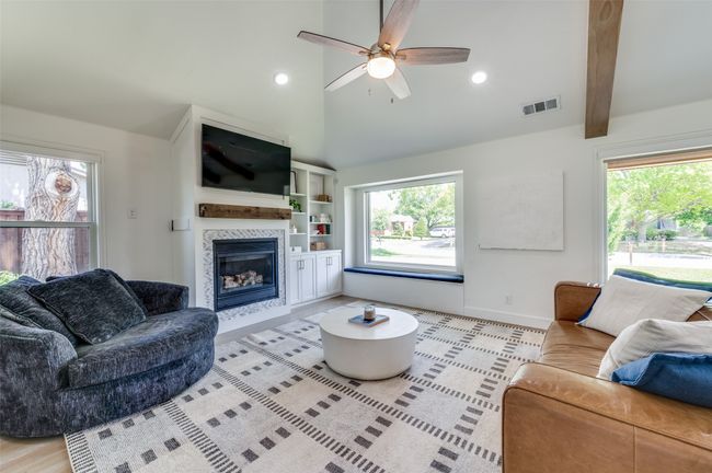 Living has windows to front and fireplace! | Image 14