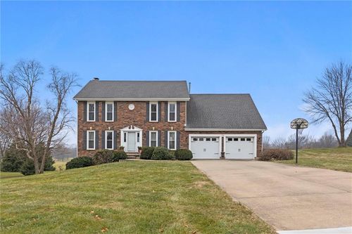 718 Sandpiper St, Raymore, MO, 64083-9268 | Card Image