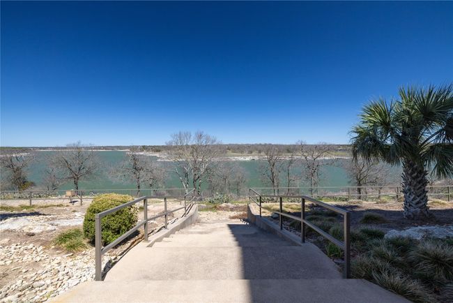 Surrounding community featuring a water view and fence | Image 28
