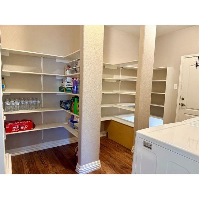 Extra large pantry and laundry room just off the kitchen | Image 16