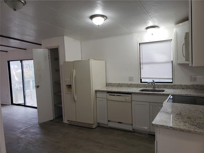 6997 Chestnut Dr, House other with 3 bedrooms, 2 bathrooms and null parking in Cocoa FL | Image 30