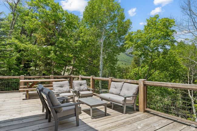 Deck featuring outdoor lounge area | Image 49