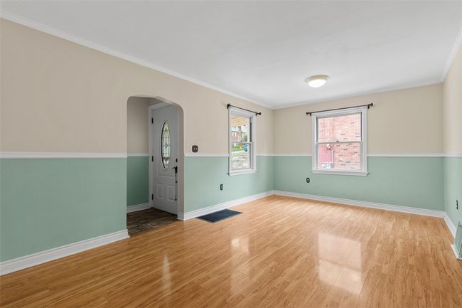There is an entry with a coat closet. | Image 16