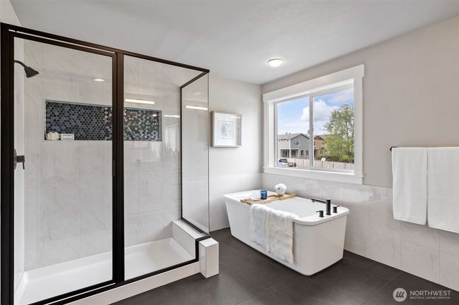 Photos are of a home in a different community and are for illustration purposes only to reflect typical finishes. May depict seller enhancements. Colors and options may vary. | Image 14