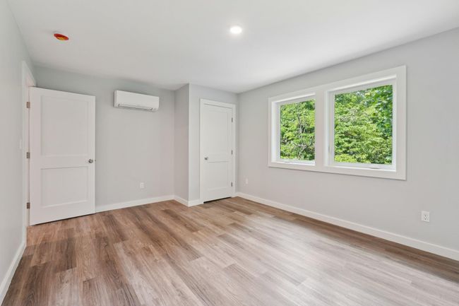 2nd fl bedroom featuring AC/Heat mini split, light wood-style floors | Image 21