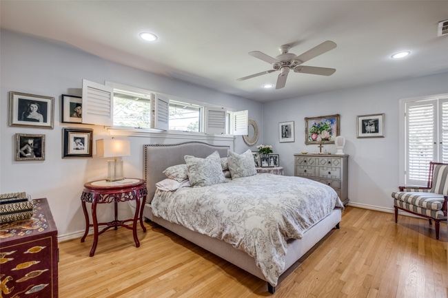 Bedroom with ceiling fan and light hardwood / wood-style flooring | Image 17