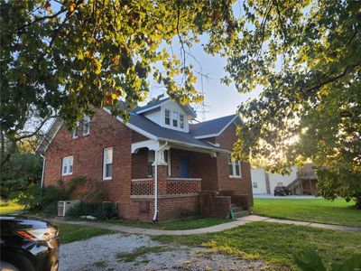 View of home's exterior featuring a yard | Image 1