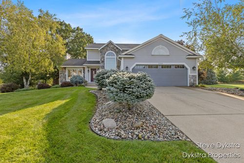 2264 Grand Valley Dr Ne, Ada, MI, 49301-9256 | Card Image