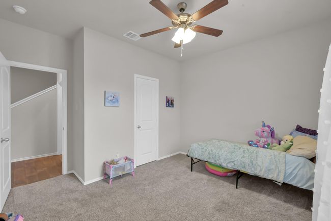 An alternate view of the secondary bedroom downstairs. | Image 21