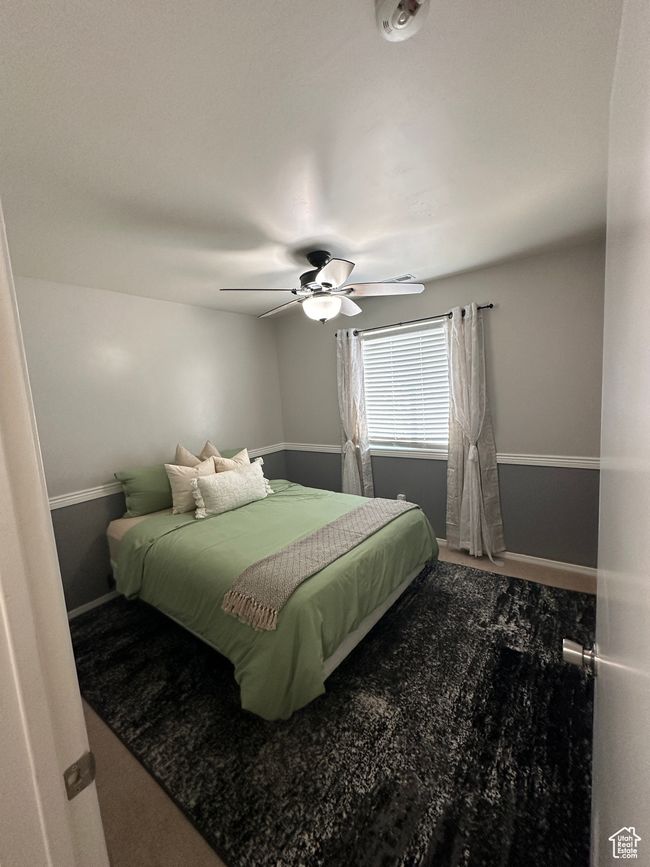 Bedroom with baseboards and a ceiling fan | Image 20