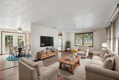 Spacious Living Room & Dining Area Offers Lots Of Natural Sunlight - Virtually Staged | Image 2