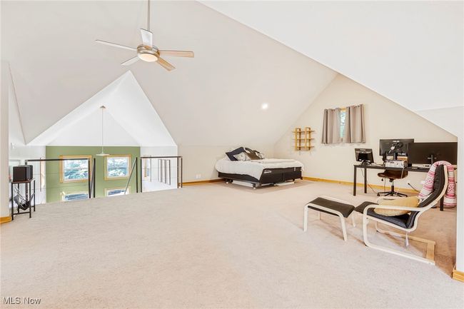 Bedroom featuring carpet flooring and vaulted ceiling | Image 31