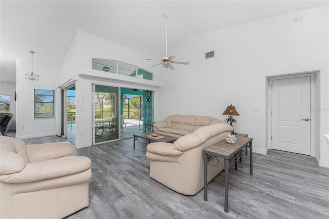 Sliding glass doors open onto the lanai | Image 7