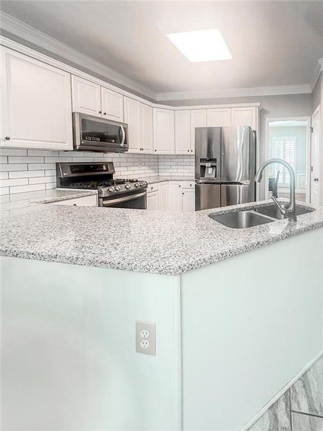 1485 Oglethorpe Run Ln, House other with 4 bedrooms, 3 bathrooms and 2 parking in Suwanee GA | Image 6