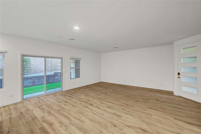 Unfurnished room with visible vents, light wood-type flooring, and baseboards | Image 10