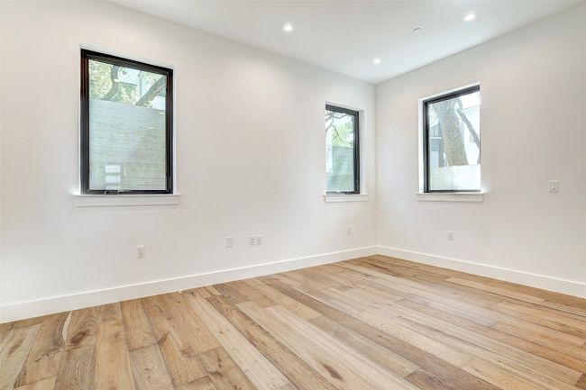 Spare room with baseboards, light wood-style flooring, and recessed lighting | Image 27