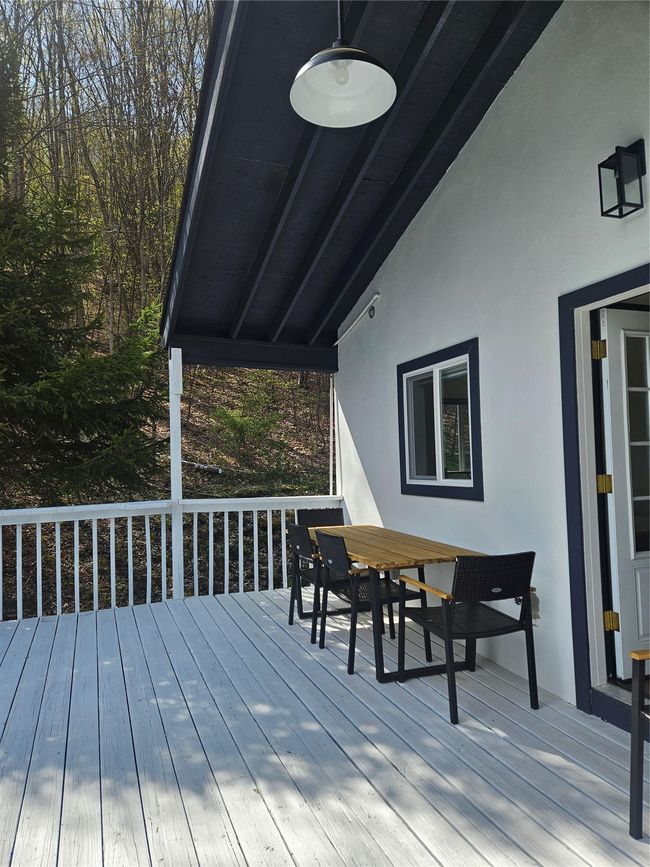 Wooden deck with outdoor dining area | Image 4