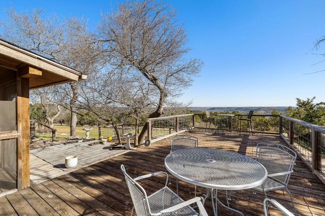 Wooden terrace featuring outdoor dining area | Image 27