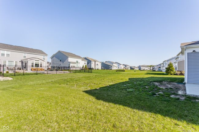 view of yard featuring fence and a residential view | Image 44
