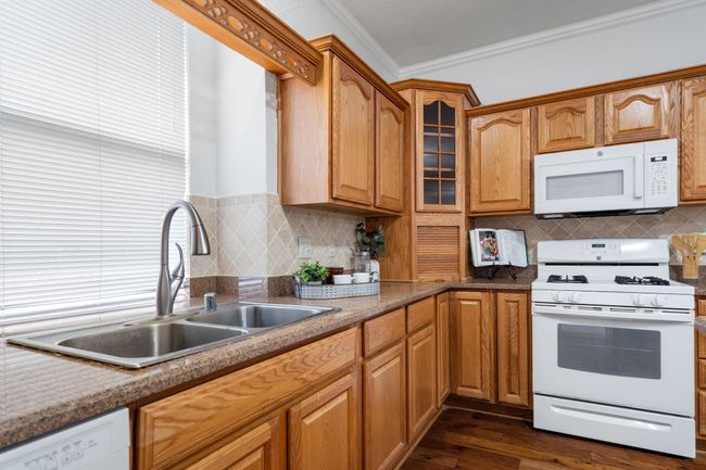 View of the kitchen toward the family room. | Image 18