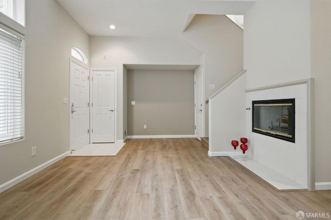 Note coat closet and alcove. Door on the far right opens into unit from garage | Image 10