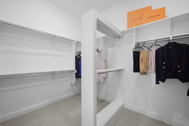 Primary room's spacious walk-in closet. | Image 22