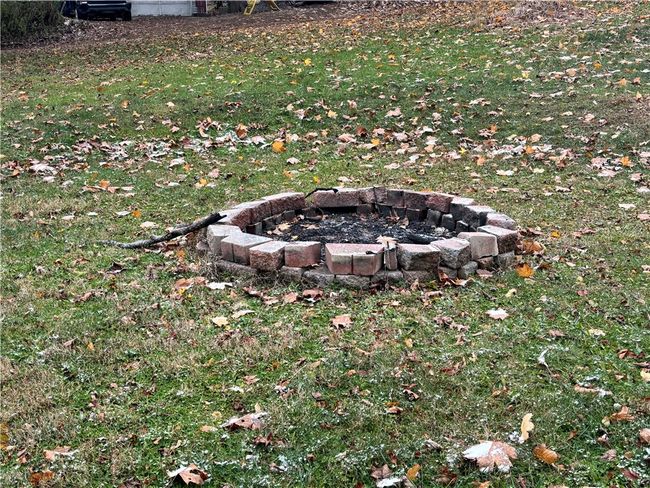 Firepit in the amazing mostly flat backyard. | Image 9