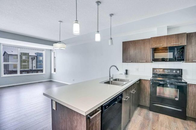 201 - 70 Saddlestone Dr Ne, Townhouse with 2 bedrooms, 3 bathrooms and 1 parking in Calgary AB | Image 10
