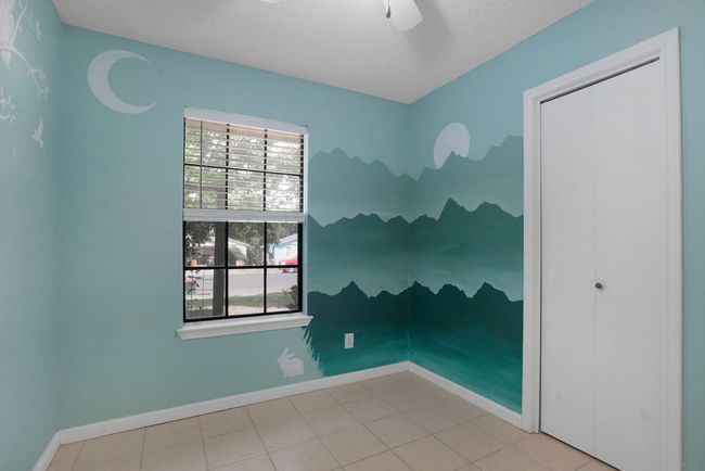 Second Bedroom featuring a hand painted scene | Image 22