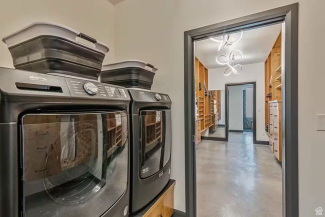 Washroom with laundry area and washing machine and dryer | Image 38