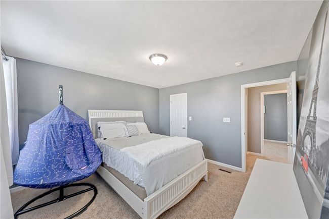 Door to the walk in closet, just beyond the bedroom door to the left is one of two large linen closets in the upstairs hallway. | Image 27