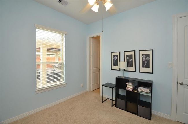 Secondary bedroom with private bathroom downstairs. | Image 23