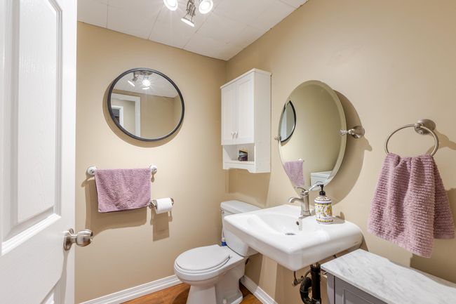 Half bath featuring baseboards and toilet | Image 33