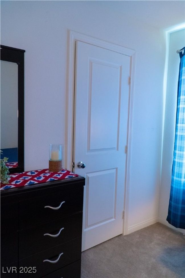 Bedroom with carpet | Image 53