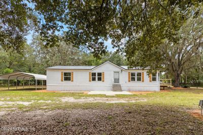 135 Sand Lake Road, House other with 3 bedrooms, 2 bathrooms and null parking in Interlachen FL | Image 1