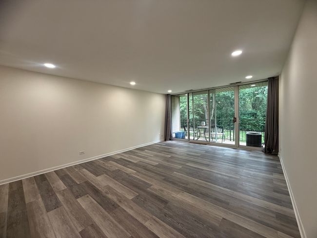 Living room with bed area | Image 4