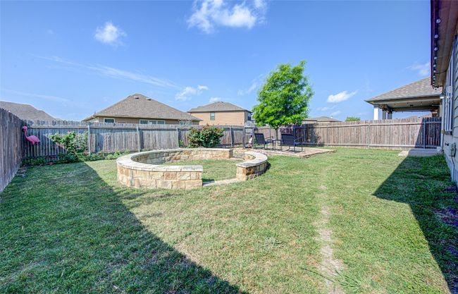 View of yard featuring a fenced backyard | Image 23